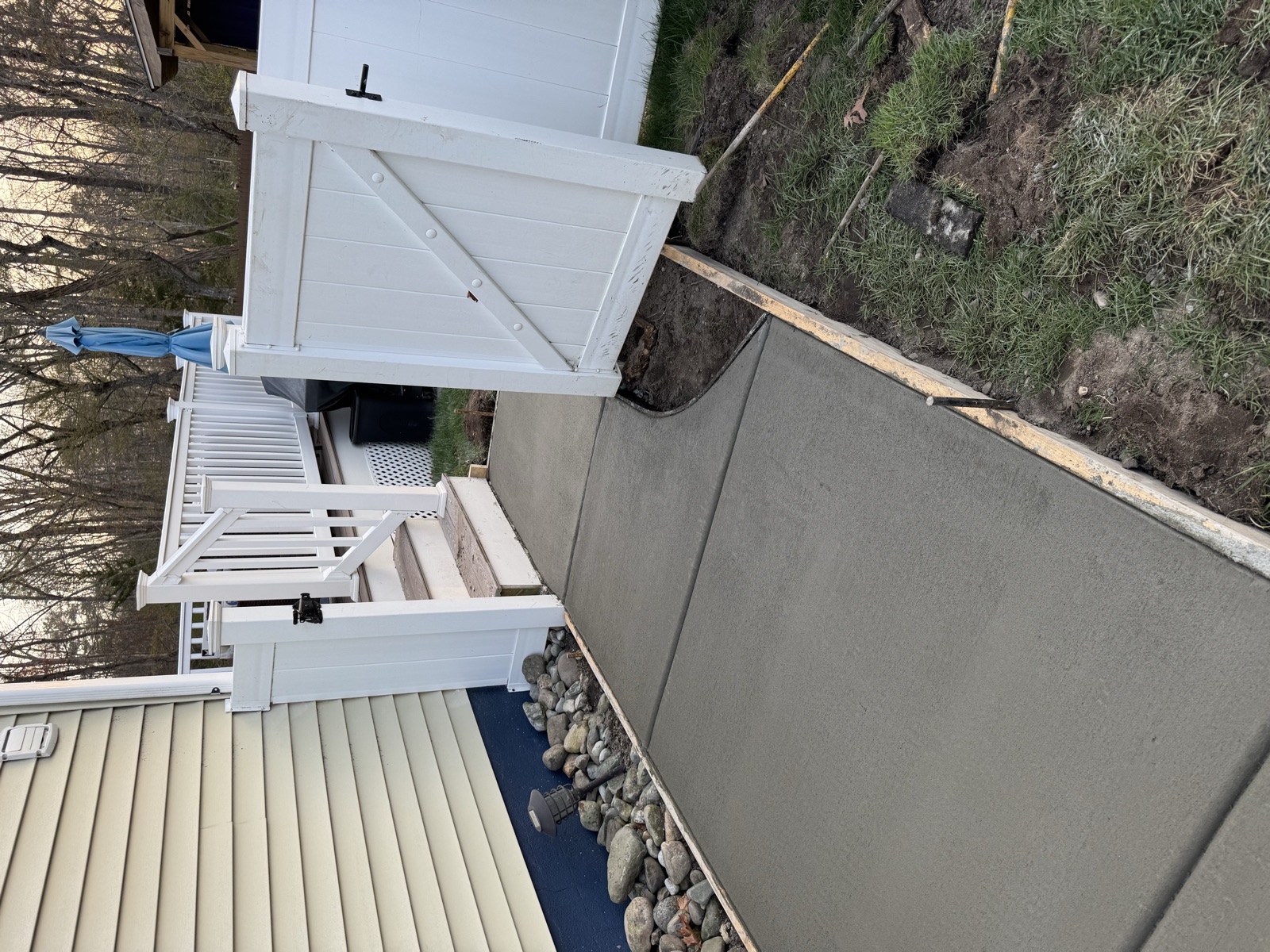 New concrete walkway and pads