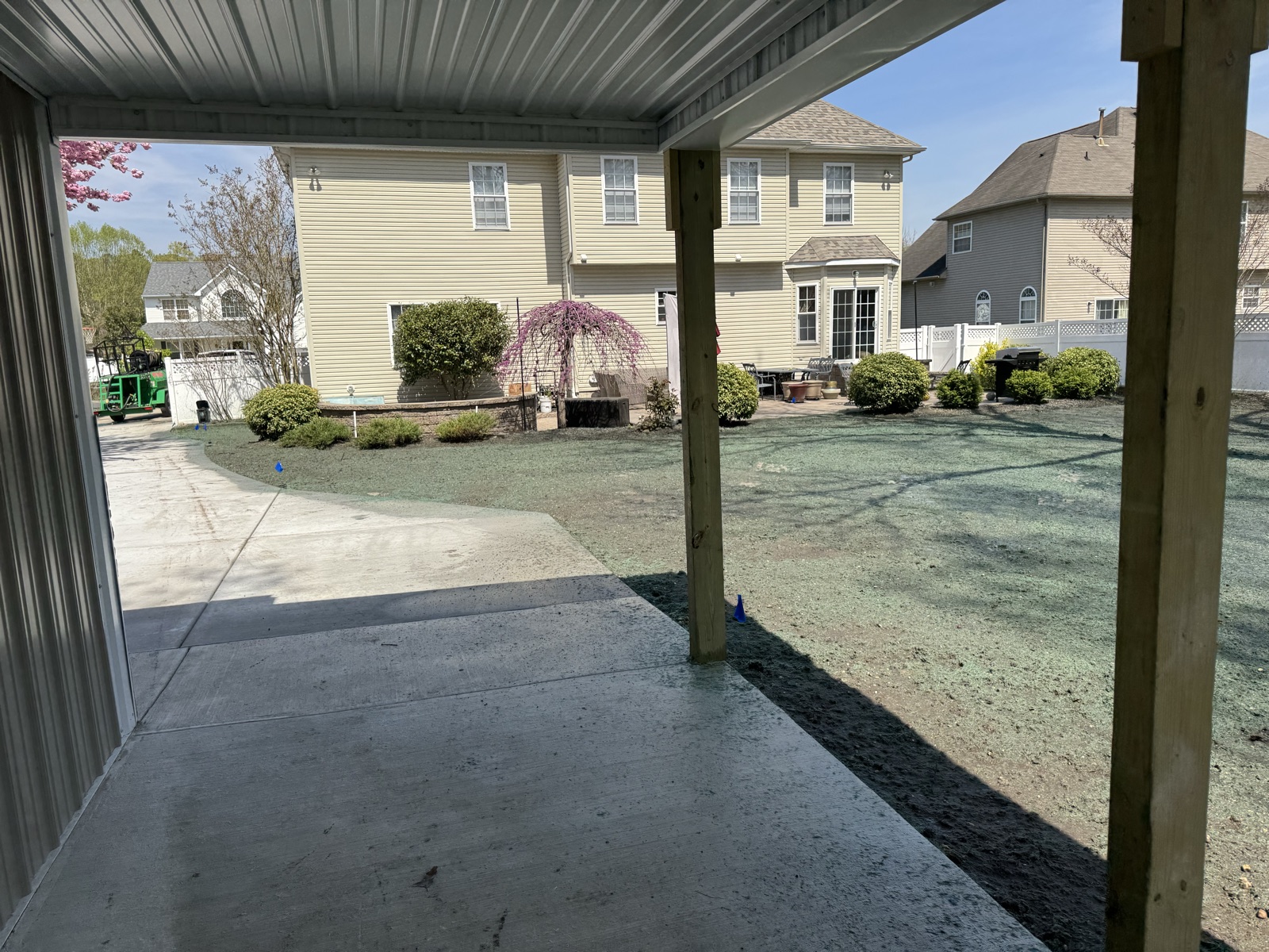Concrete patio and regraded yard