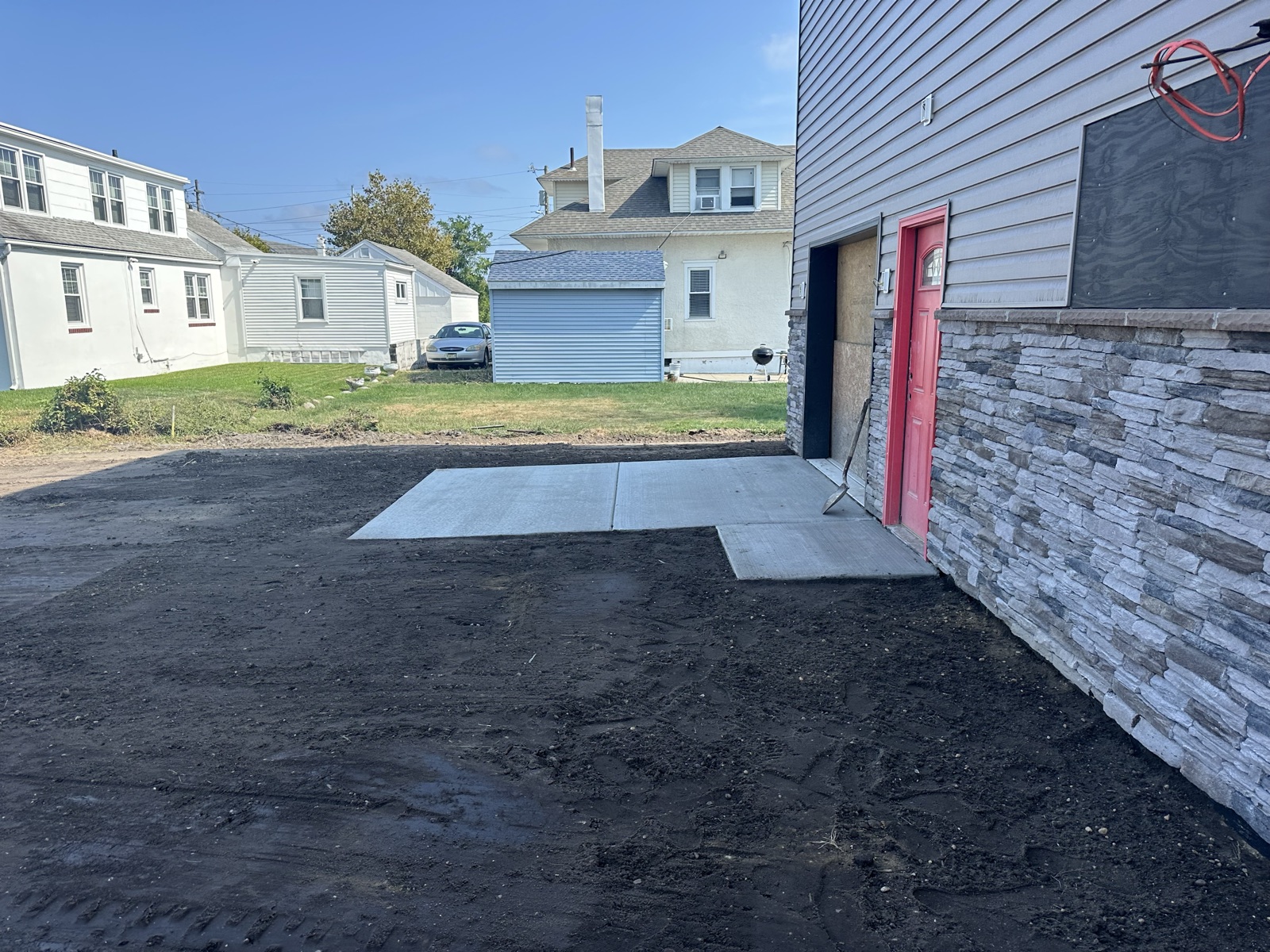 New asphalt pad and driveway